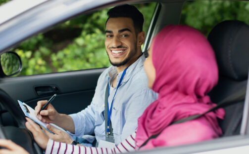 driving-school-test-handsome-young-arab-instructo-2023-11-27-04-53-14-utc